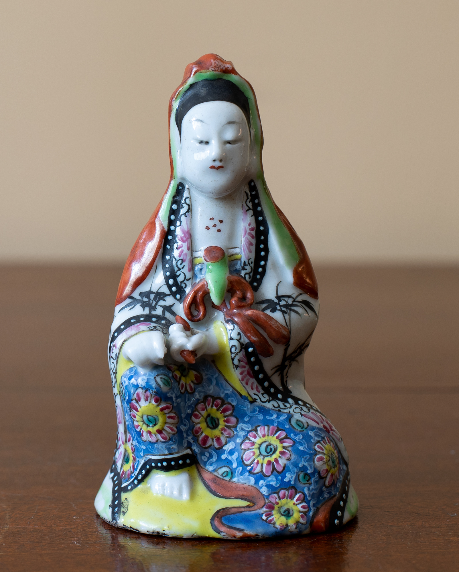Asian sitting figure