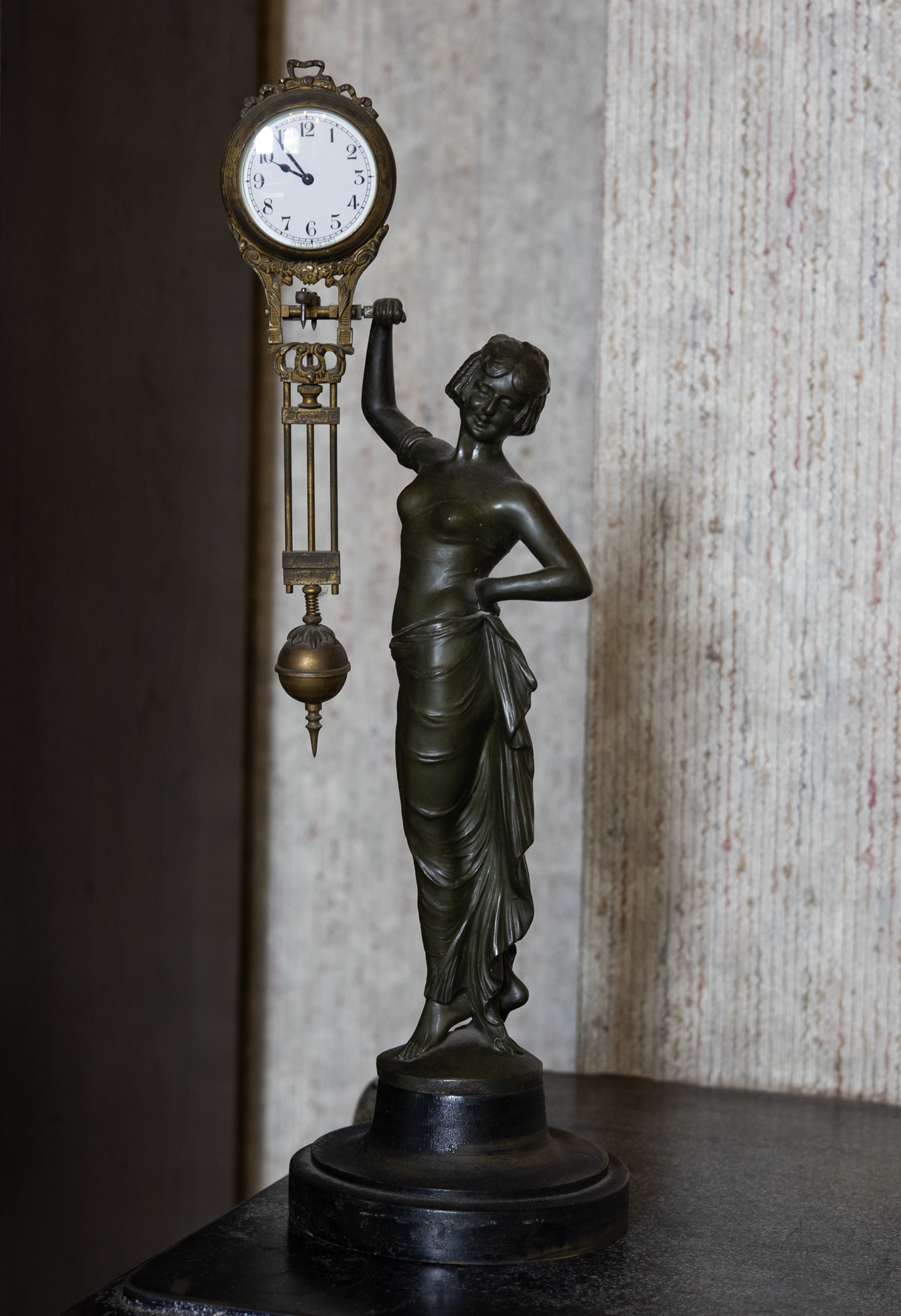 Women clock statue